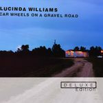 Car Wheels On A Gravel Road