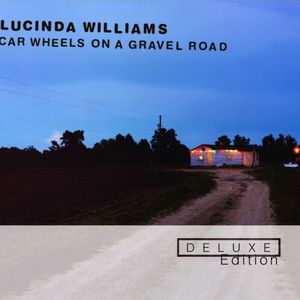 Car Wheels On A Gravel Road